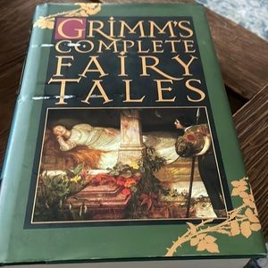 Grimms Complete Fairy Tales, hardcover in great condition. cover surface tear